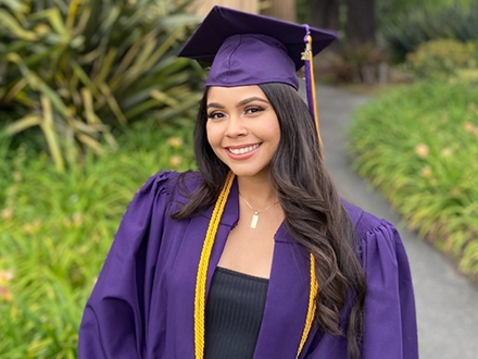 Karina Martinex wearing a graduation gown.