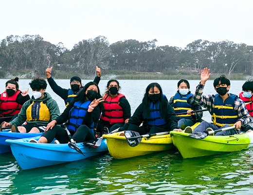 SF State students kayaking at Lake Merced